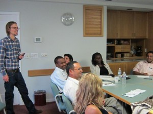 Picture of Johannes presenting to a group