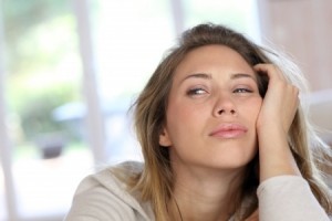 Image of woman feeling overwhelmed and listless